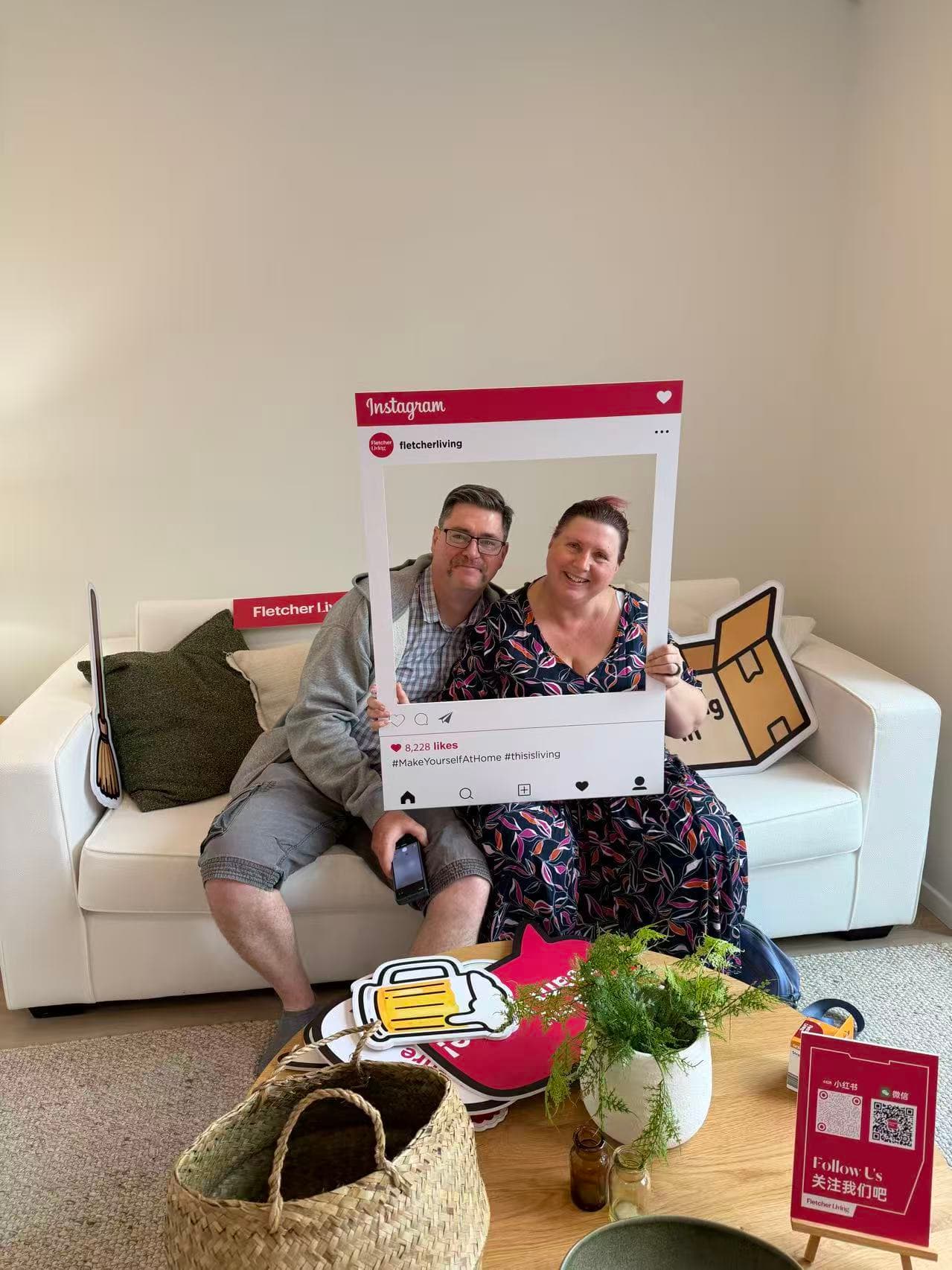 Couple taking part in a Fletcher Living community open-day photo activation